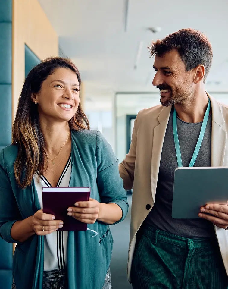 Two professionals collaborating in an office
